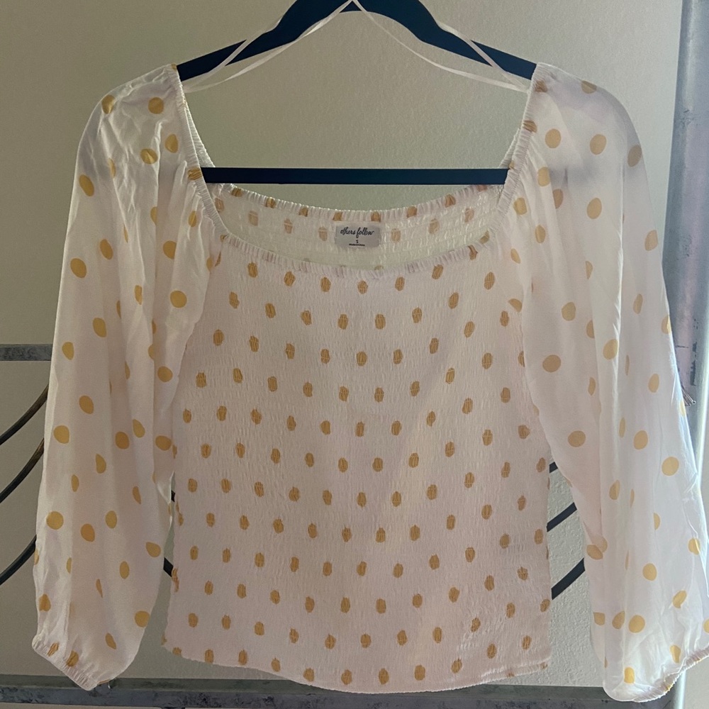 Never worn. White and yellow polka dot top.